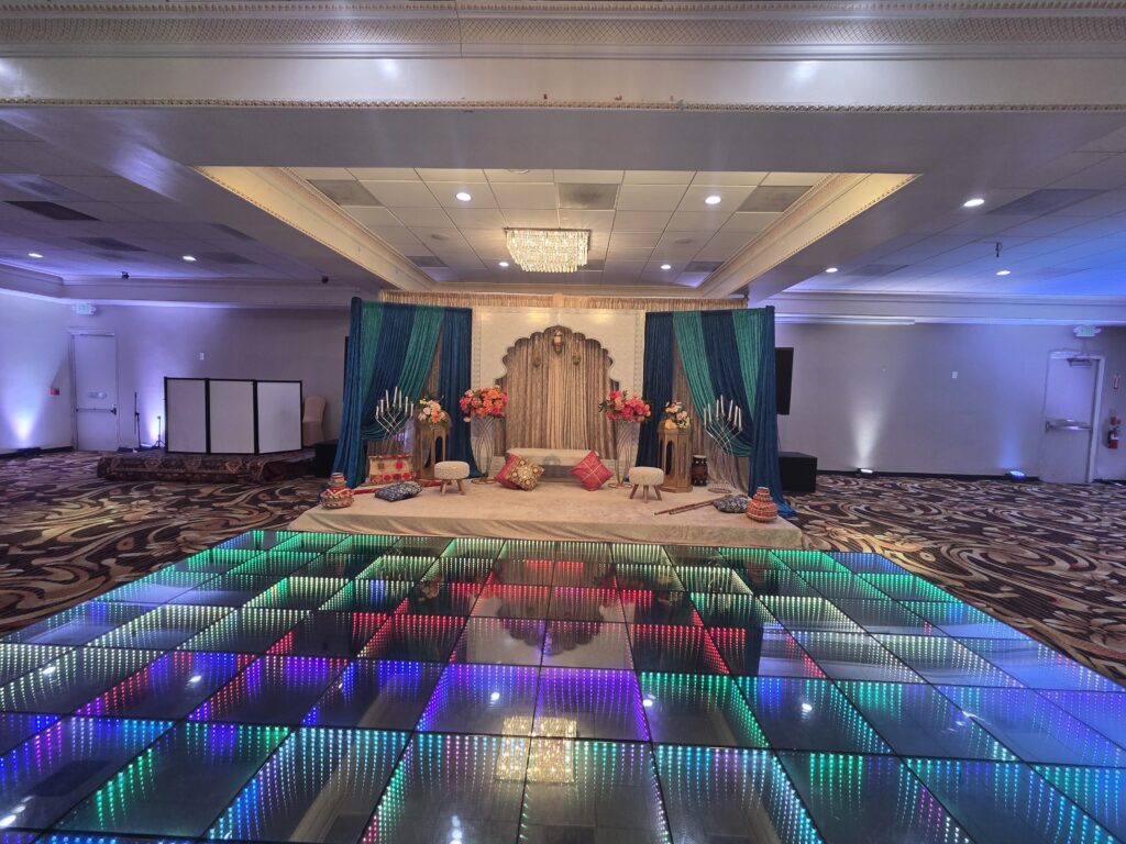 Grand Blue Golden Floral Theme Wedding Reception. Stage Backdrop Decoration