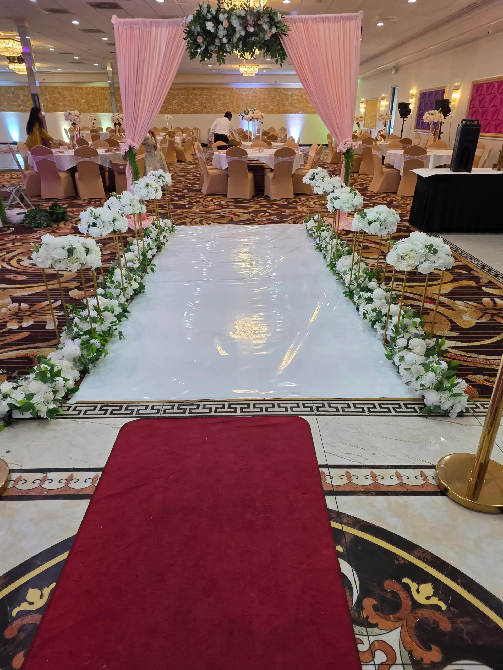Pink floral entrance at Shubham Halls